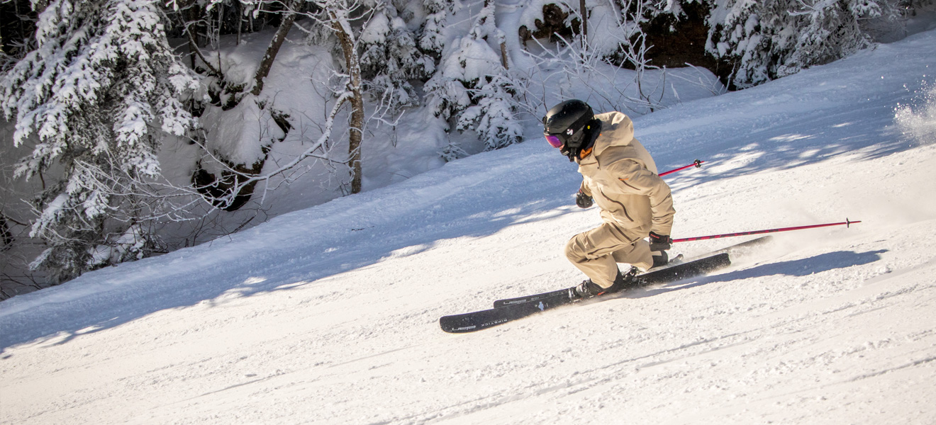 2022 Elan Ripstick 106 Black Edition Ski Review: Full Width Action Image 1